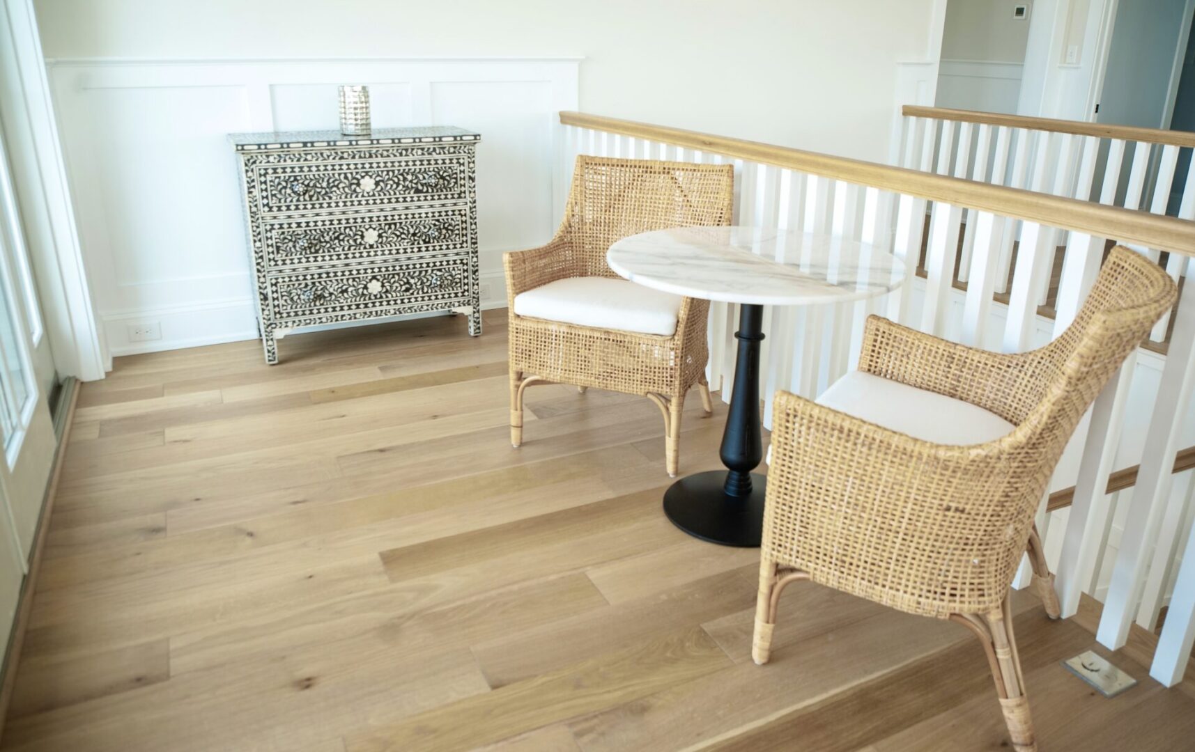 Two armchairs and a cabinet drawer