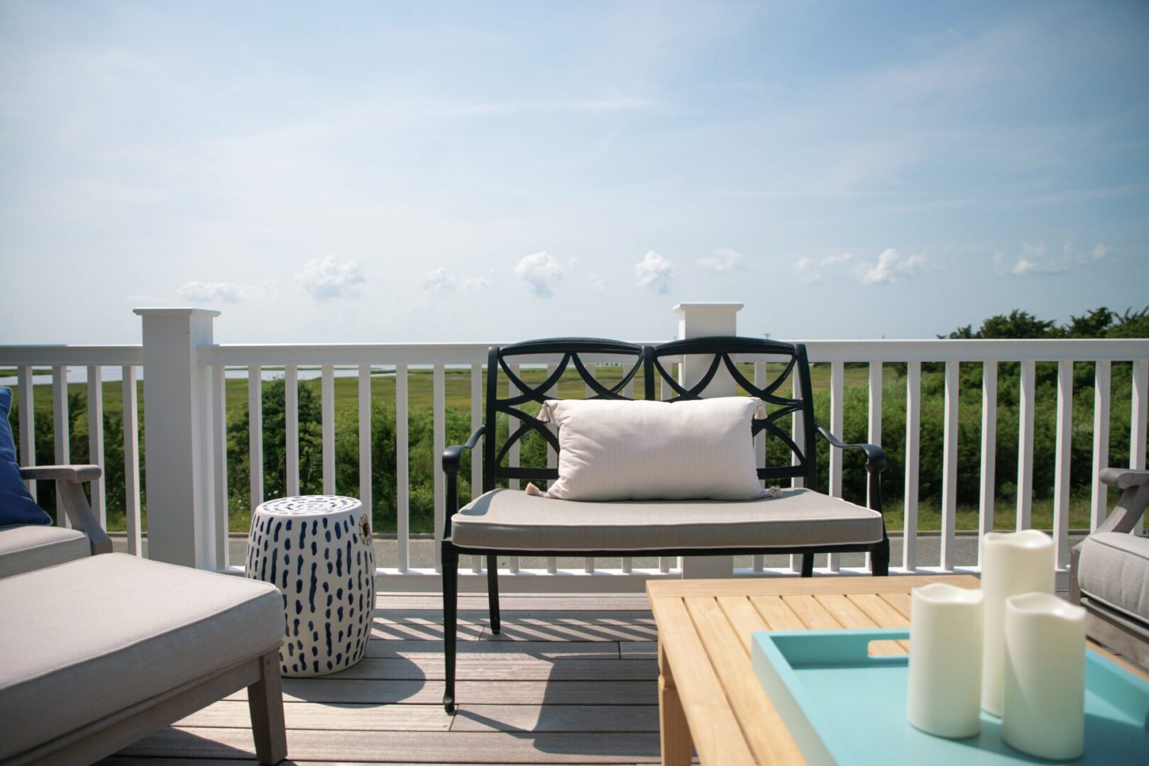 A patio with a view of the countryside