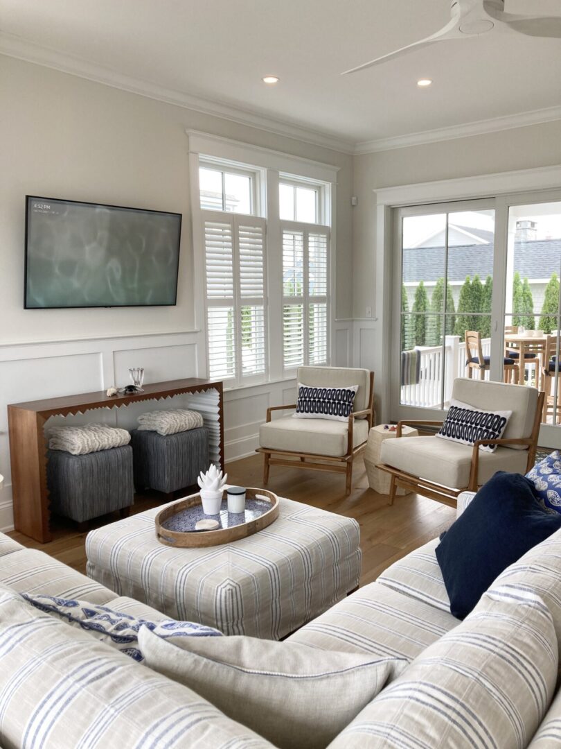 A living room with furniture and appliances